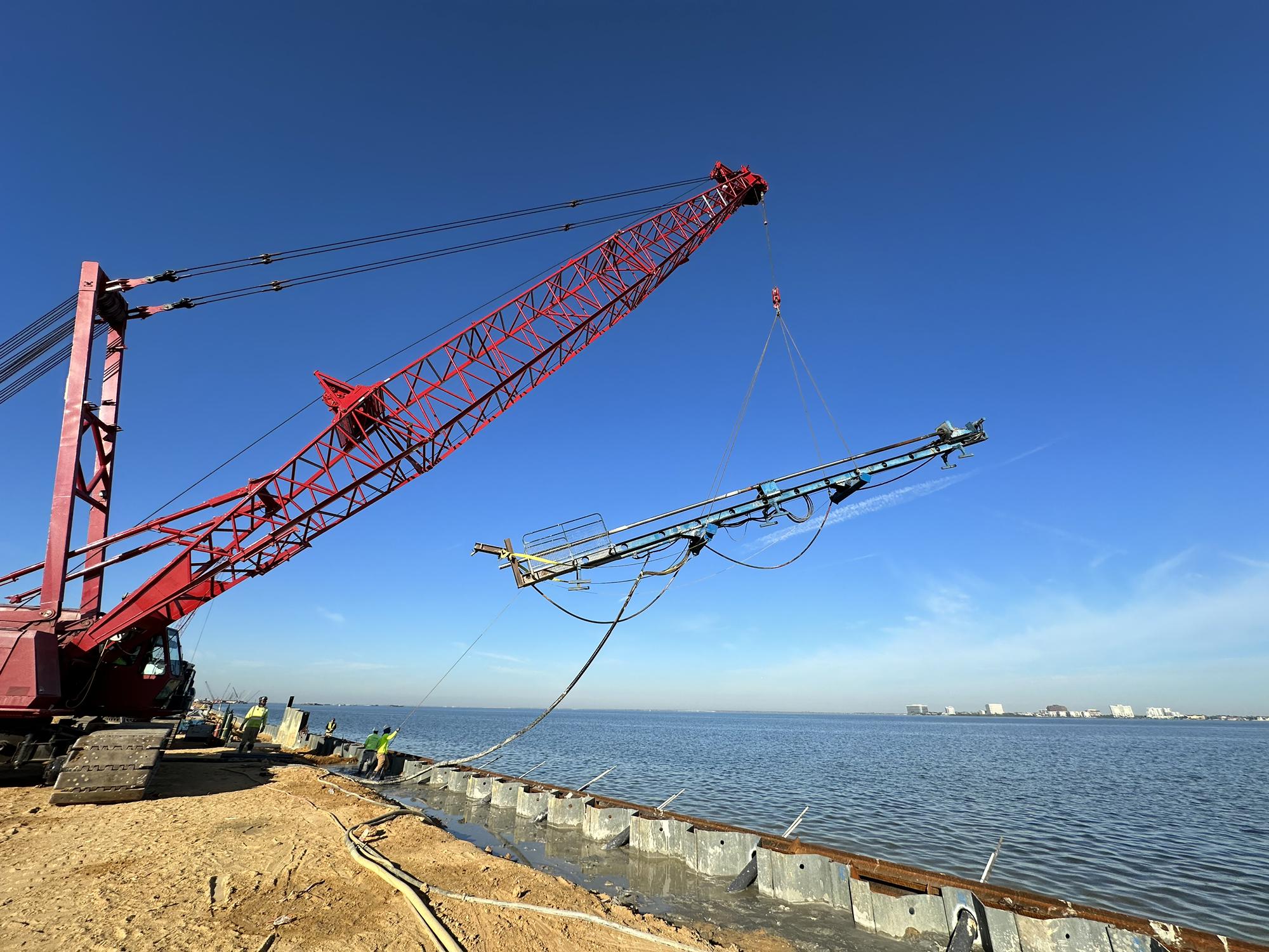 Schnabel’s crane suspended drill for waterfront projects earth retention