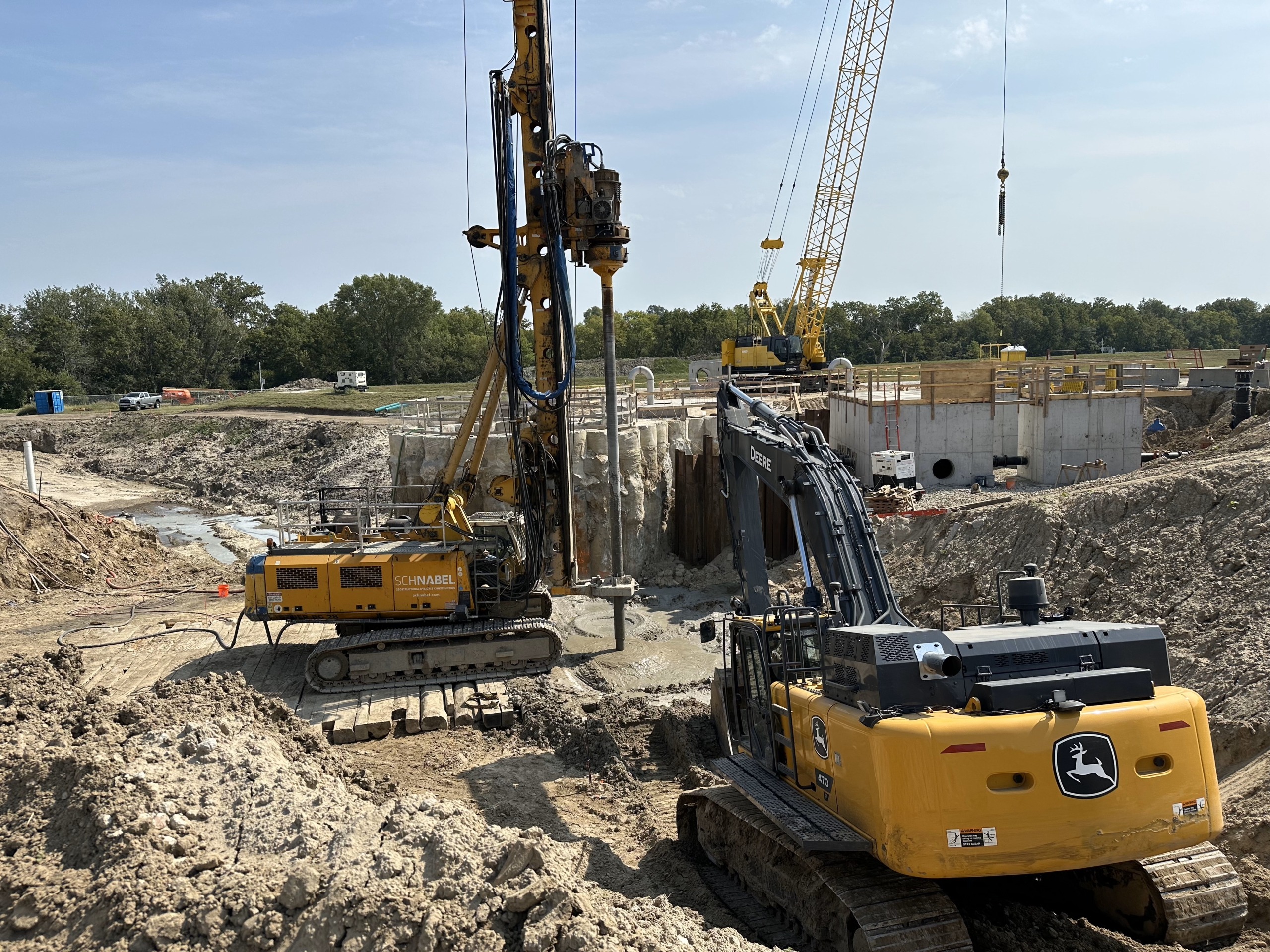 Soil mixing with excavator for spoils control soil mixing
